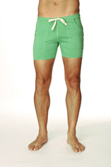 Transition yoga short in bamboo green with mint green fabric, cream drawstring tie, and two front pockets
