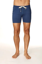 Navy blue transition yoga short with white drawstring and front pockets designed for athletic use