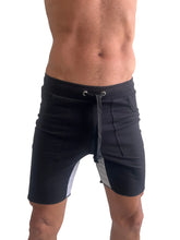 Black tri-color ultra-flex yoga track shorts with gray side panel and drawstring waistband for athletic use