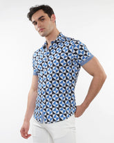 Blue and black geometric patterned triangles printed performance short-sleeved button up shirt with striped cuffs