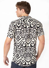 Black and white short-sleeved button-up tribal abstract s s shirt with intricate ikat pattern perfect for casual wear