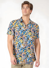A vibrant blue and yellow floral-patterned tropical abstract short-sleeve button-up shirt with a classic collar
