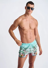 Men’s turquoise tropics print swim shorts with palm tree and fruit design and mesh lining for comfortable wear