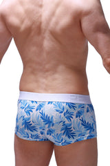 Blue and white tropical leaf patterned men’s briefs trunk maeha with solid white elastic waistband
