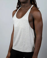 A heather gray sleeveless tulio racerback tank top showing the back side with a comfortable fit