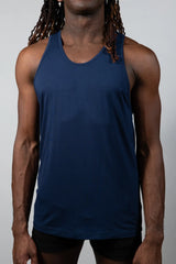 A navy blue tulio solid tank sleeveless athletic top with rounded neckline and smooth stretchy fabric