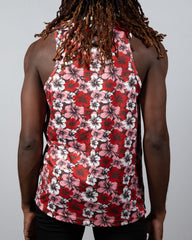A vibrant red pink and white hibiscus print tank top with a black background perfect for casual summer wear