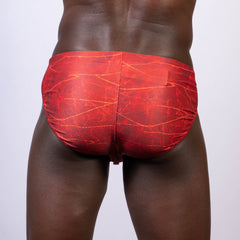 Red swim trunks lightning swim brief with marbled pattern designed for comfortable swimwear use