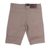 Beige twill stretch skinny shorts with subtle texture and two back pockets shown from the back side