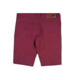 Maroon twill stretch skinny shorts in denim with a brown leather brand patch at the back waistband