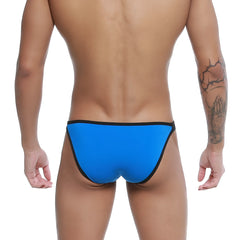 Bright blue u-station calypso bikini swim trunks with black trim designed for comfortable beachwear