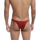 Red form-fitting thong made of smooth stretchy fabric shown from the back in u-station dream bikini burgundy u0002-601
