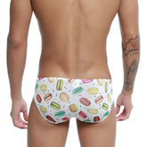 White swim trunks with a playful colorful macaron and sprinkle pattern from u-station macaron bikini u0022-112 collection