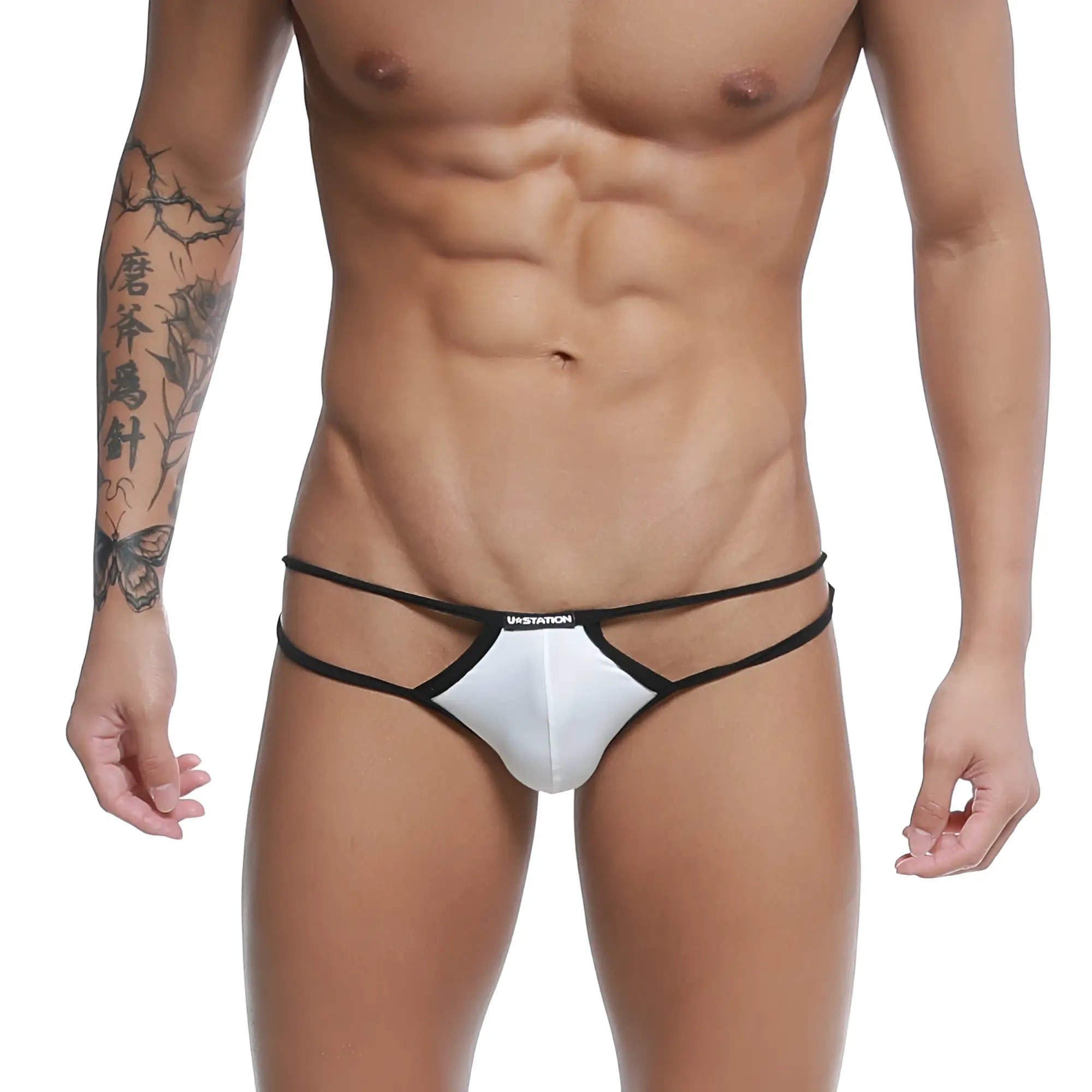White and black ustation thong bikini with sleek minimalist design from the u station skeleton collection