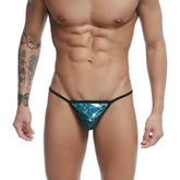 Shiny teal sequined U-Station string thong with black trim in blue peacock color front view