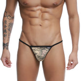 Black and gold patterned U-Station string thong with sleek modern design featuring peacock motif, front view