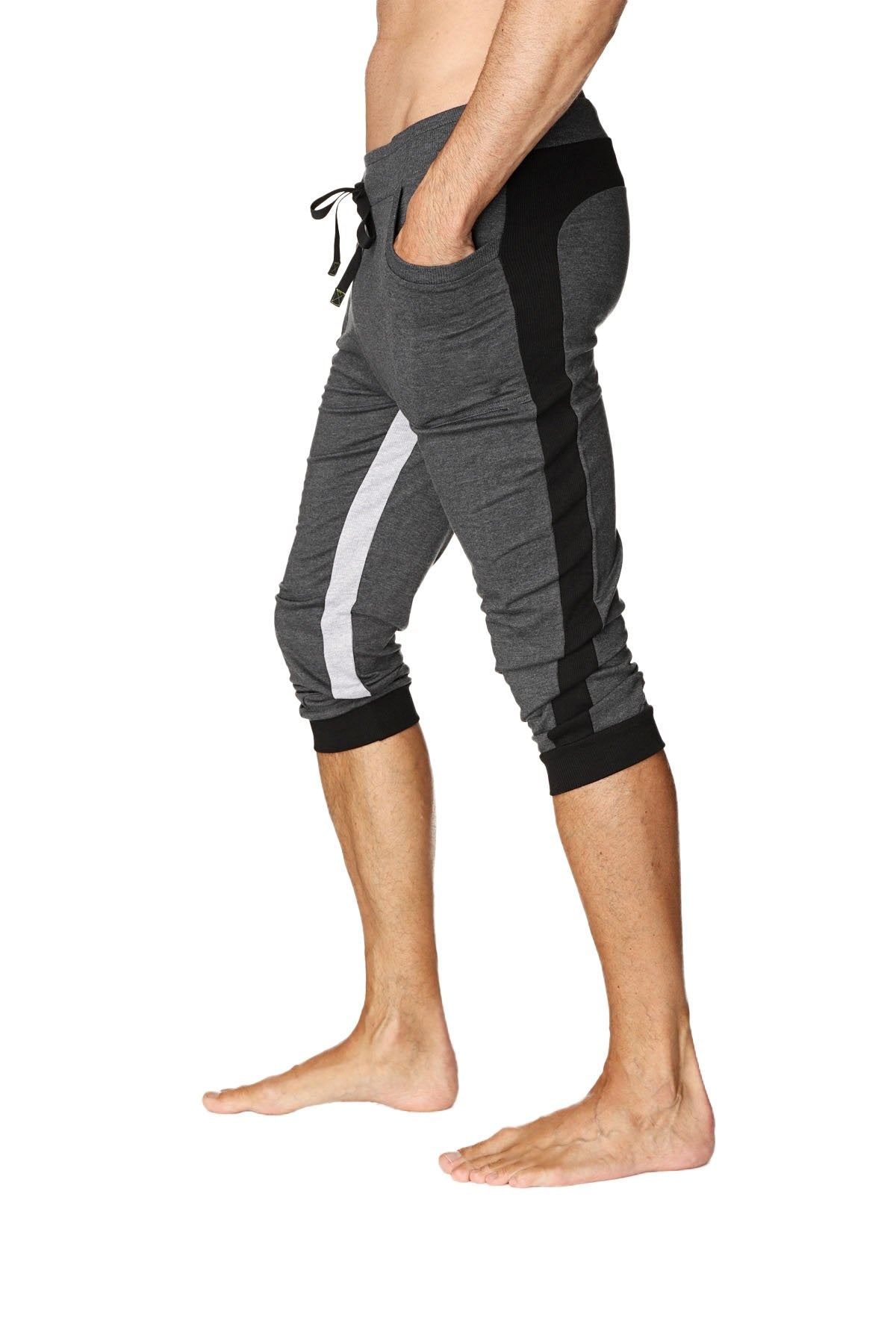 Gray and black ultra-flex tri-color cuffed yoga capri pants with white side stripe designed for athletic use