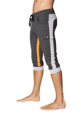 Ultra-flex tri-color cuffed yoga pant in charcoal with grey and orange, featuring gray side stripe and black drawstring waistband
