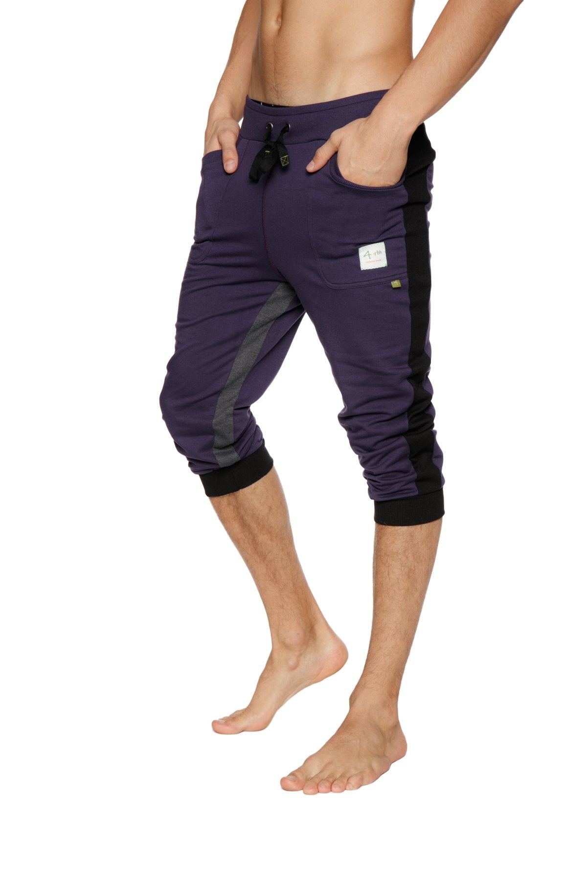 Ultra-flex eggplant capri-length joggers with black side panels and elastic cuffs designed for yoga and comfort
