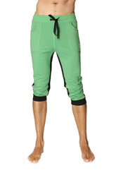 Green capri-length ultra-flex tri-color cuffed yoga pant with black side panels and elastic cuffs