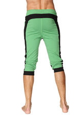 Green ultra-flex tri-color cuffed yoga pants with black side panels and elastic cuffs for flexible comfort