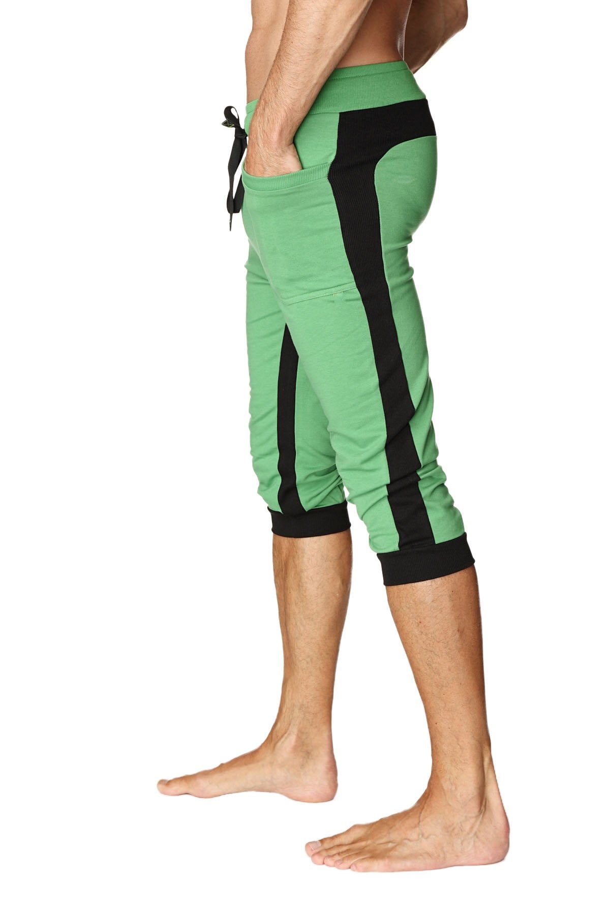 Green and black ultra-flex tri-color cuffed yoga capri pants with drawstring waistband ideal for athletic use