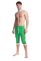 Green ultra-flex tri-color cuffed yoga pant with white drawstring and side panels in capri-length athletic style