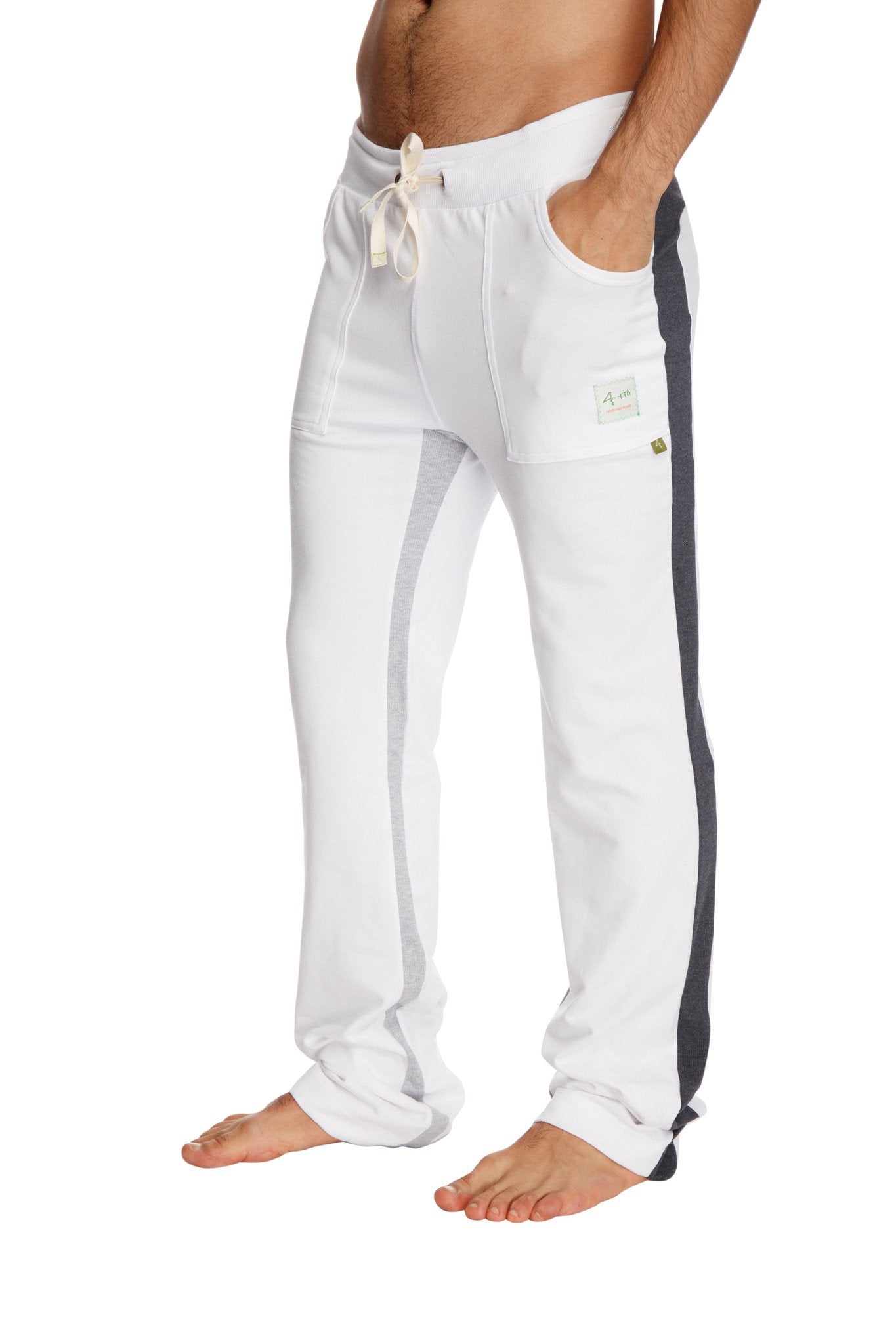White ultra flex yoga sweatpants with black side stripe and cream drawstring for comfortable athletic wear