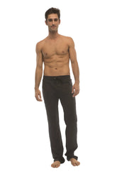 Black ultra flex cotton joggers with drawstring waist and elastic cuffs designed for yoga and track use