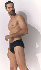 Black men’s Unico Zelmur briefs in color 99-black with a subtle textured pattern front view