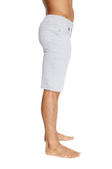 Back side of urban tactical at home dress shorts heather grey light gray denim with subtle green logo on pocket