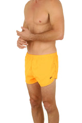 Uzzi running short bright yellow athletic shorts with elastic waistband and small side logo for running