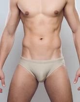 Beige v10 core bikini briefs with a subtle embroidered logo on the waistband in a soft fabric