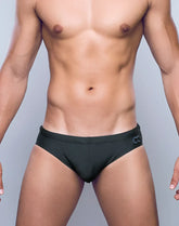 Black v10 core bikini swim trunks with subtle waistband logo designed for comfortable beach and pool use