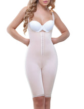 Vedette 938 full body control suit in nude with central button closure and lace trim on hem in beige form-fitting fabric