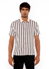 A man wearing a vertical stripe open stretch knit shirt with rib collar in black and off-white colors