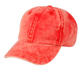 A coral-colored vintage washed cotton cap with distressed denim and visible stitching for casual wear