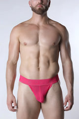 Bright pink void mesh thong briefs with form-fitting design and matching elastic waistband with embossed branding