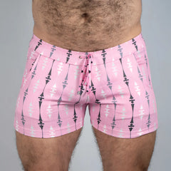 Pink wallpaper print linen texture shorts with black and white geometric arrow pattern and drawstring waistband