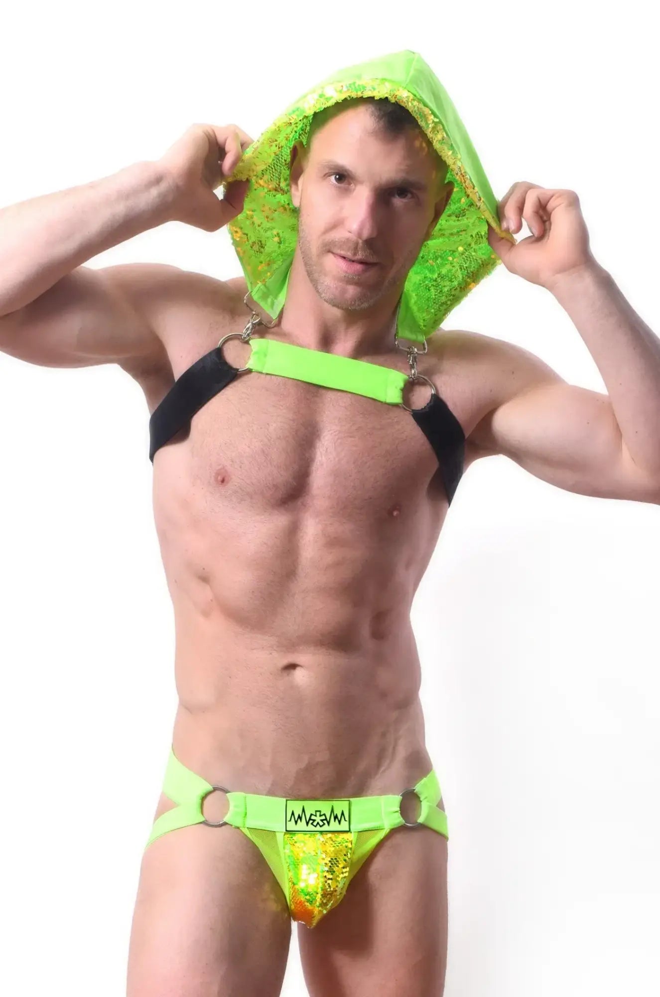 Neon green sequined hood harness set with black straps and metallic rings for edgy fashion statements