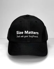 Black cotton WildmanT baseball cap with white embroidered size matters just ask your boyfriend text on front