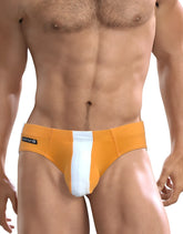 Wildmant big boy pouch swim brief orange in orange and white stripes with black brand tag on waistband