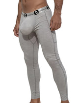 Gray form-fitting cotton WildmanT long johns underwear with a black wildman logo on the waistband and monster cock pouch