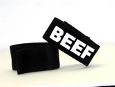 Black fabric wristband with bold white beef lettering for wildmant fetish max cock-ring beef accessory