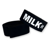 Black elastic wristband with bold white milk it logo for wildmant fetish max cock-ring design