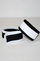 Black and white elastic wristband with a simple clean design for wildmant max cock rings product
