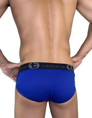 WildmanT modal big boy pouch brief in royal blue with black elastic waistband featuring wildman logo and stylized t emblem