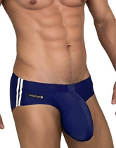 Navy blue men’s swim trunks with white side stripes and wildman logo on waistband for swimming and beachwear