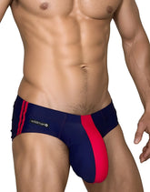 Wildmant monster cock swim brief in navy and red featuring bold vertical stripes for athletic style swimwear