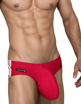Red athletic swim briefs with white side stripes and a black wildman logo tag from WildmanT Monster Cock line